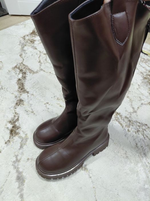 Продам сапоги новый