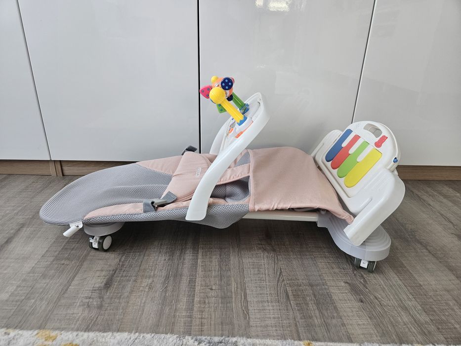 Balansoar bebeluși NiceKids, roz, pliabil, cu pian și jucării