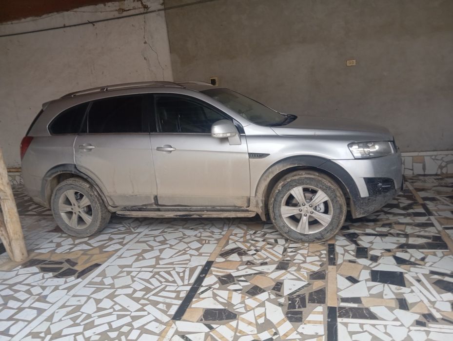 Каптива двигатель 2.4 сотилади