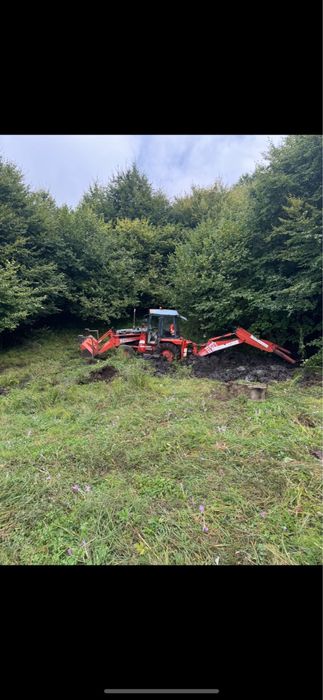 Buldoexcavator fai komatsu