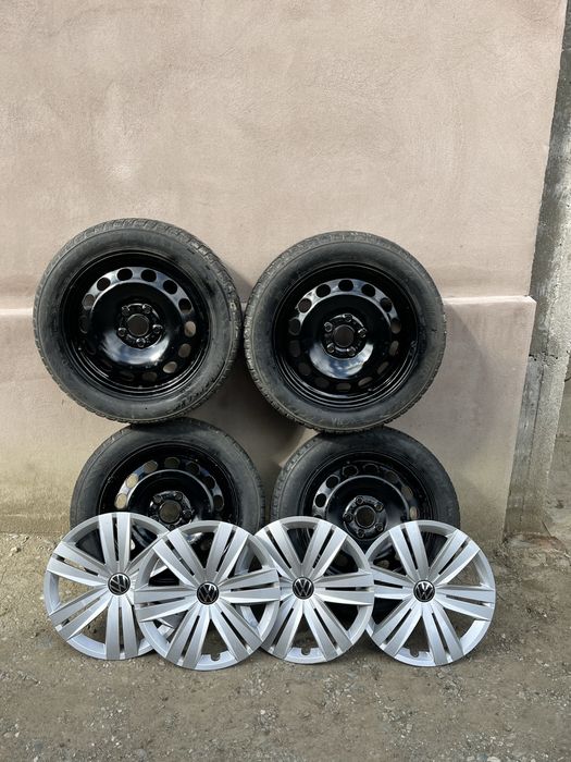 Set 4 jante tablă VW Golf 5 R16 + anvelope 205/55 R16 + 2 seturi capace VW