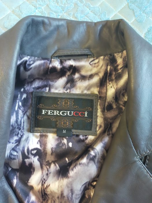 Плащь женский новый, кожанный