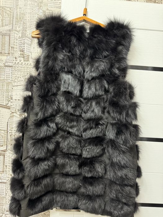 Продам  меховую жилетку