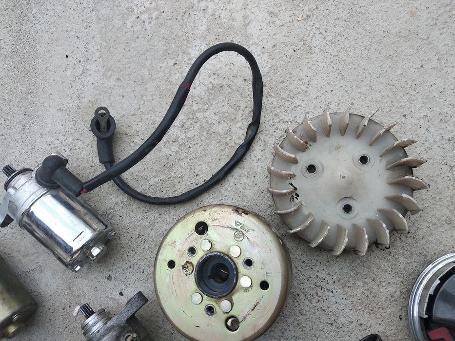 Запчасти для скутера Хонда или Сузуки