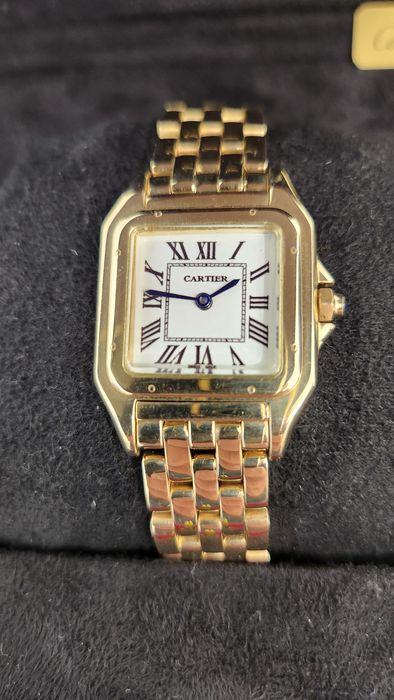 Золотые часы Cartier