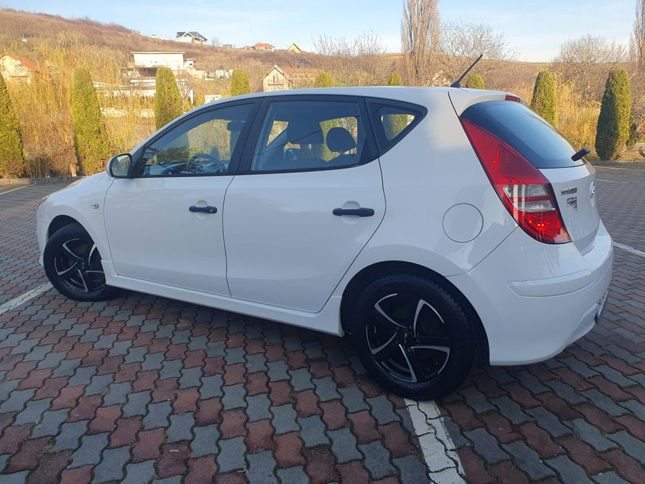 -Hyundai i30 facelift-klimatronik-2011-1.4benzina-105cai-euro5-adusa din germania-