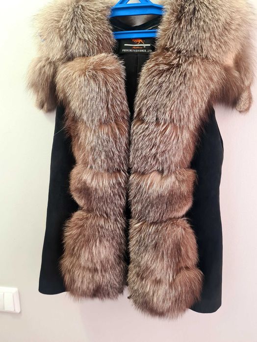 Жилетка, безрукавка