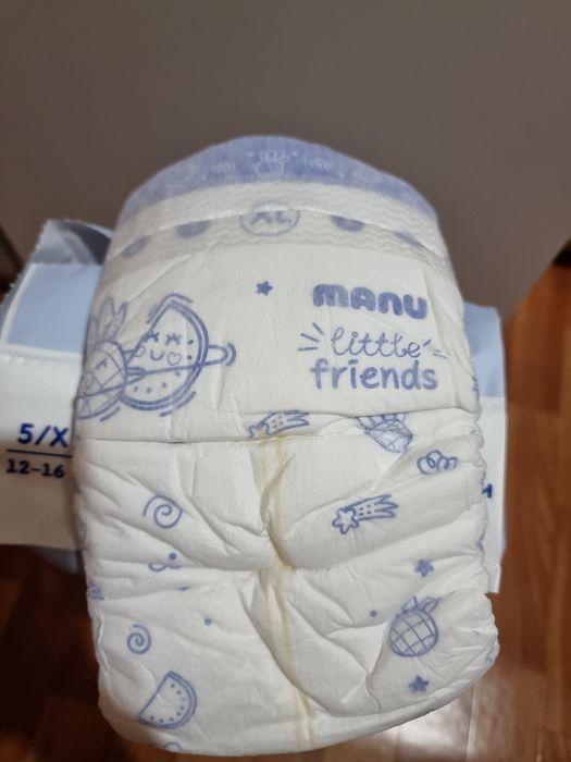 Подгузники Manu.