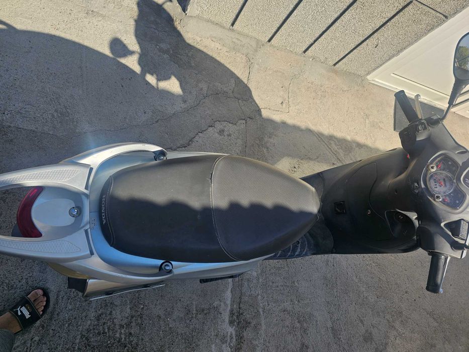 Скутер  Хонда 125i