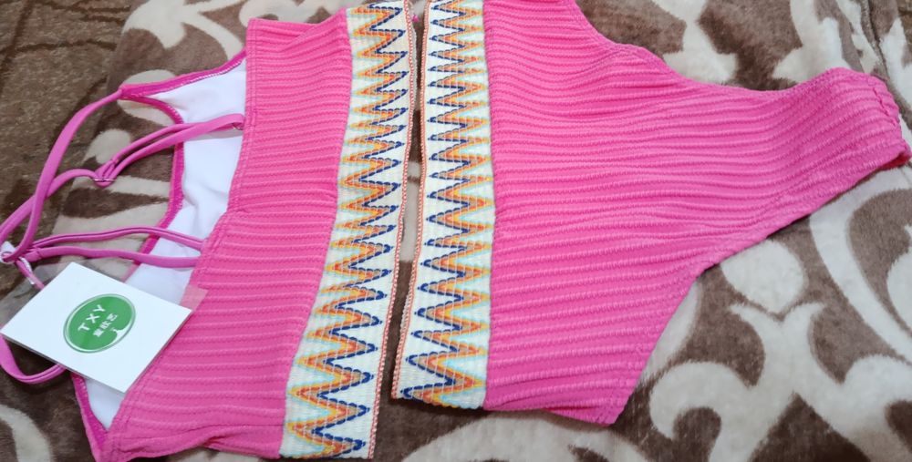 Продам женский купальник новый