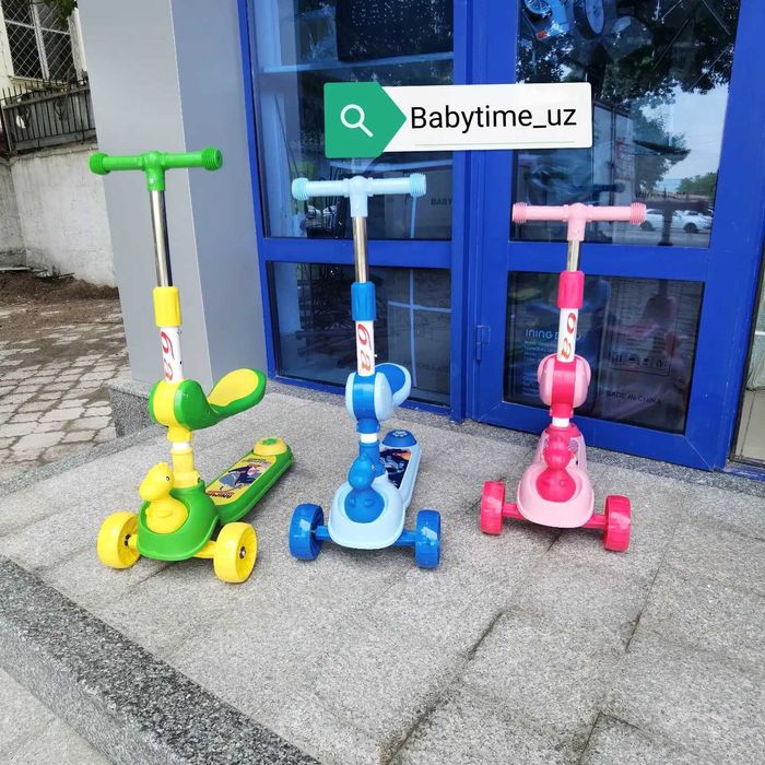 Новый детский самокат с динозавриком. Отличный подарок к празднику.