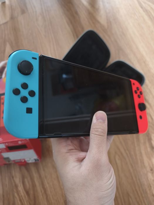Nintendo Switch 1 OLED + SD card + Legends of Zelda case