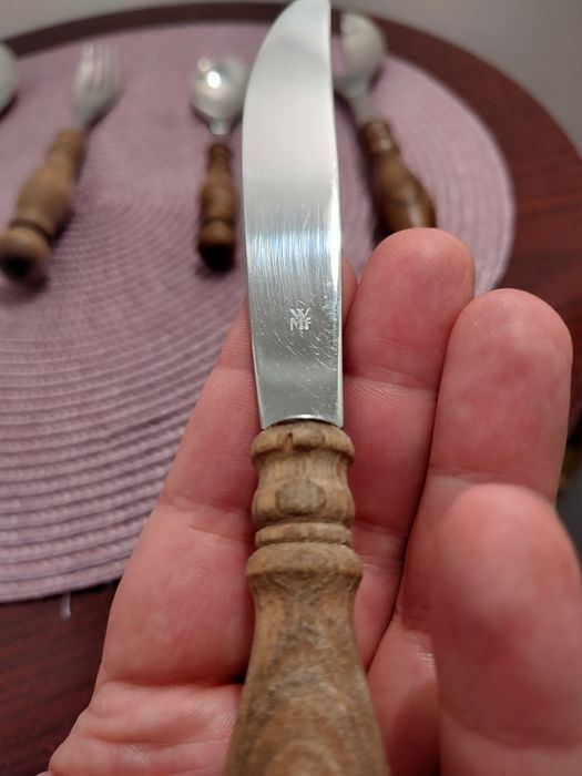 Superb set de tacâmuri WMF Burgund