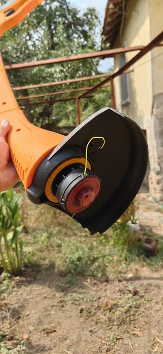 Тример за косене на тревни площи.