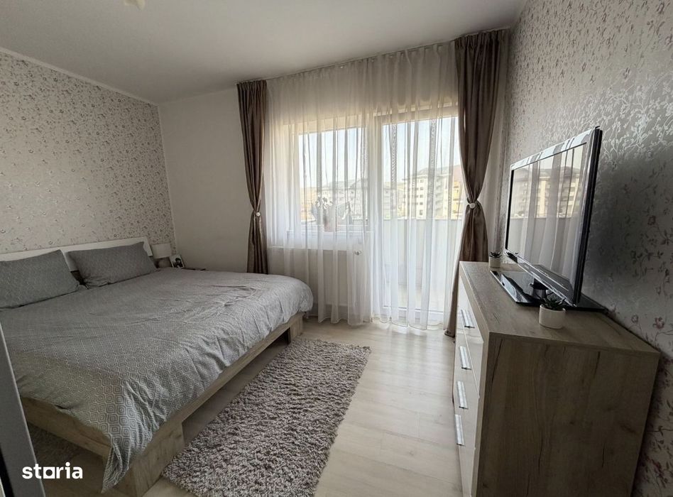 Apartament cu 2 camere,terasa,parcare inclusa,etaj intermediar