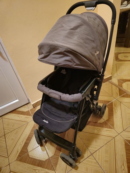 Căruț Joie 3 poziți in stare bună ,pelerina de ploaie inclusă nouă