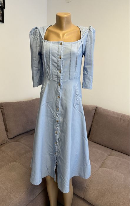 Rochiță super elastică , ca și nouă , peste genunchi