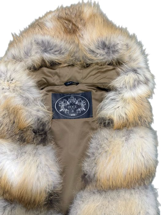 Жилет из меха лисы