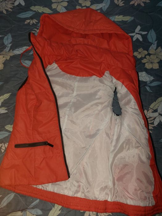 Жилетка в хорошем состоянии