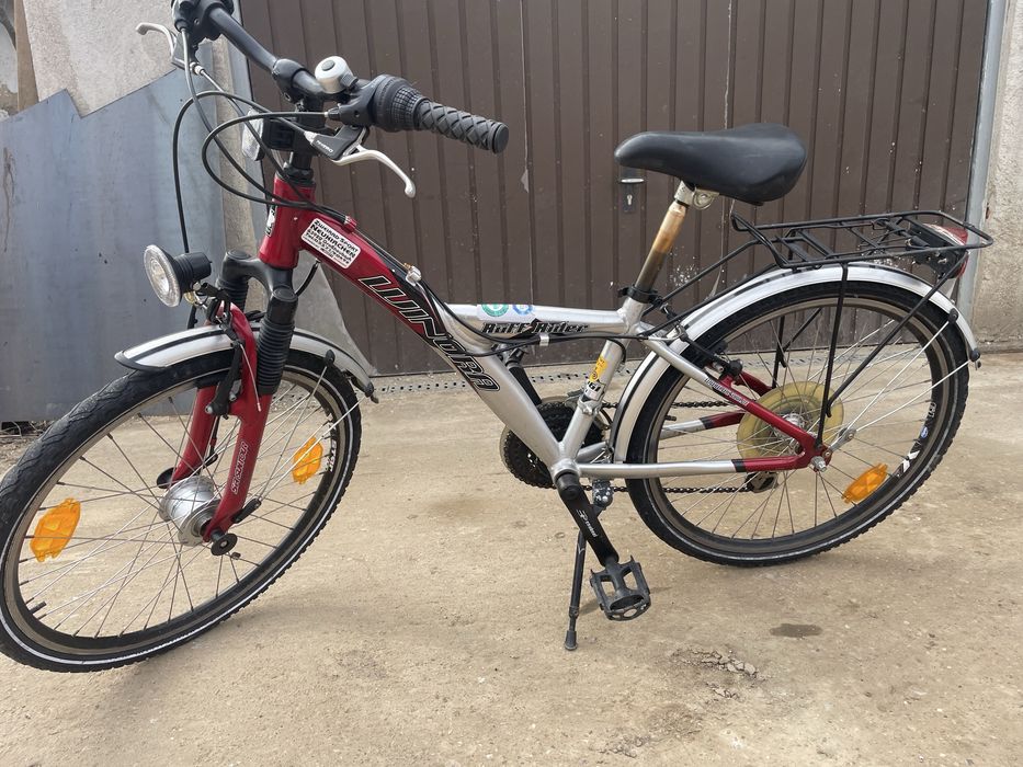 Vand o bicicleta de copi roti 24 ca noua aluminiu