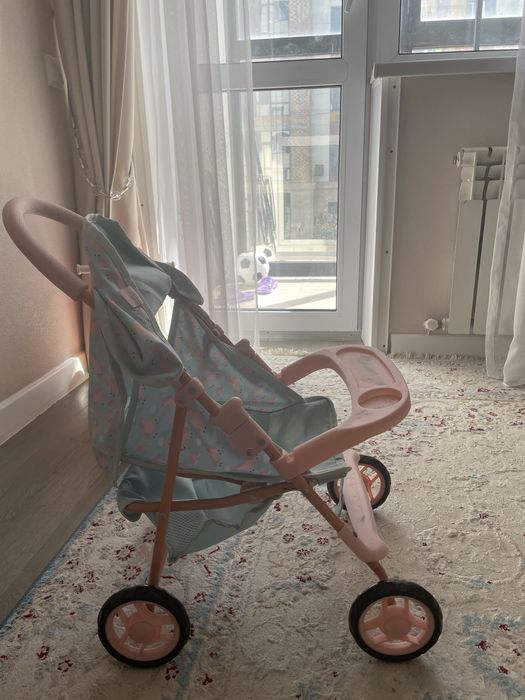 Прогулячная коляска для кукол