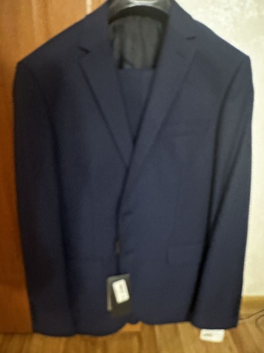 Новый костюм р 50 р 6