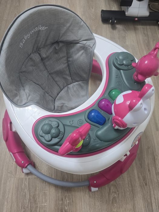 Продам ходунки с музыкой