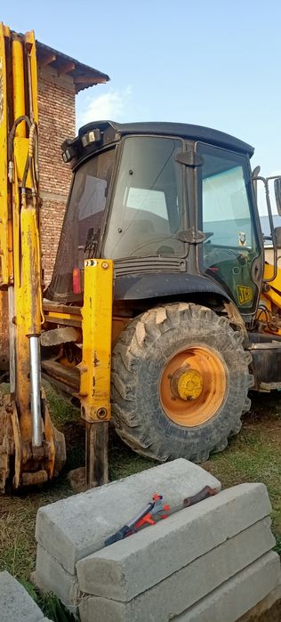 Экскаватор погрузчик 3в1