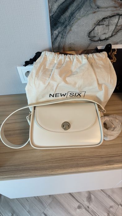 Продам кожаную сумку 23 см