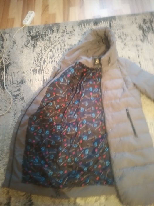 Продам женский пуховик