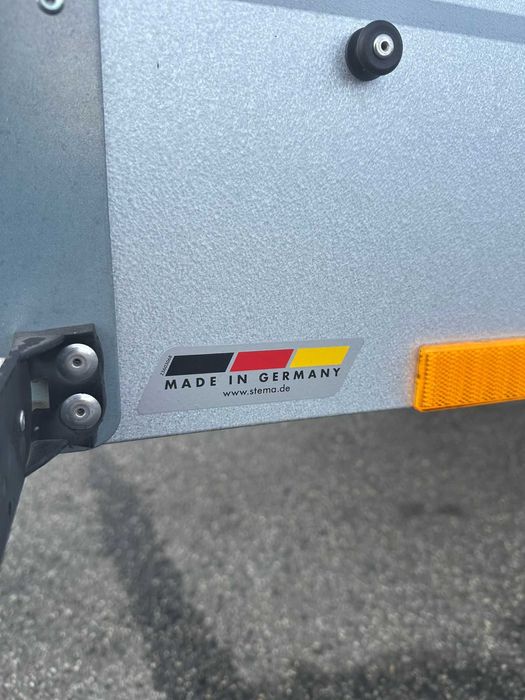 REMORCA 750KG stema cu capac si jante aluminiu