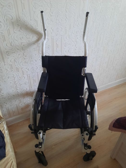 Детская инвалидная коляска