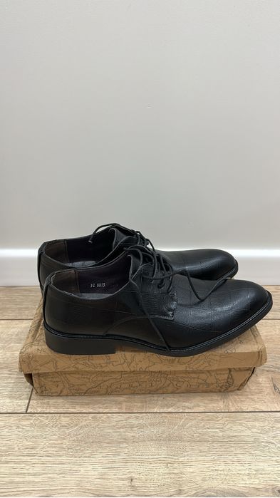 Продам новые туфли мужские