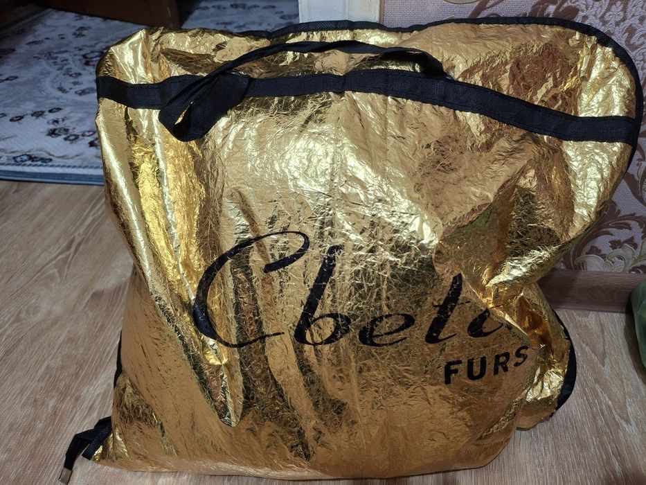 Қара норка шуба.