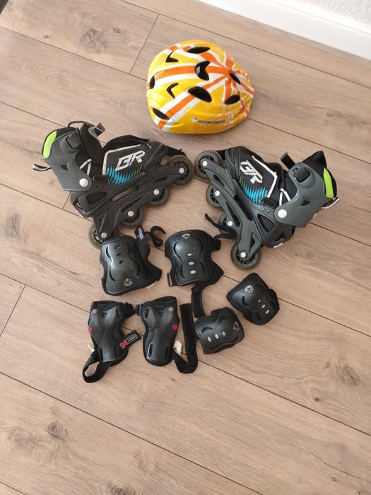 Роликовые коньки