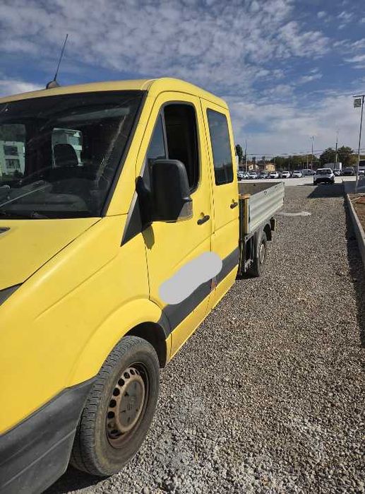 Volkswagen Crafter DOKA, an 2007, varianta cu cabină dublă și benă în spate, nebasculabilă.