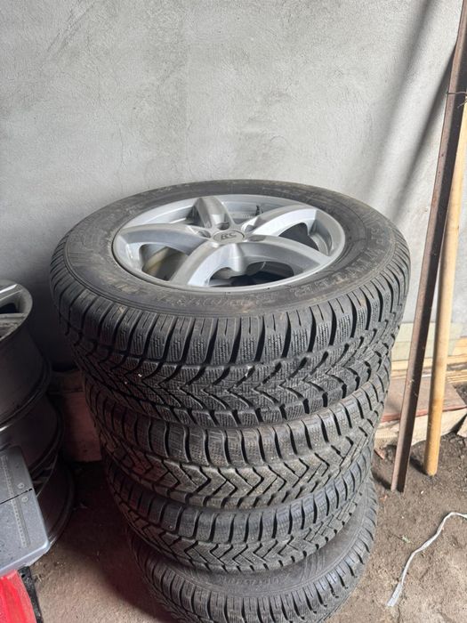 Set Dunlop cauciucuri iarna +jante  215/65 r16