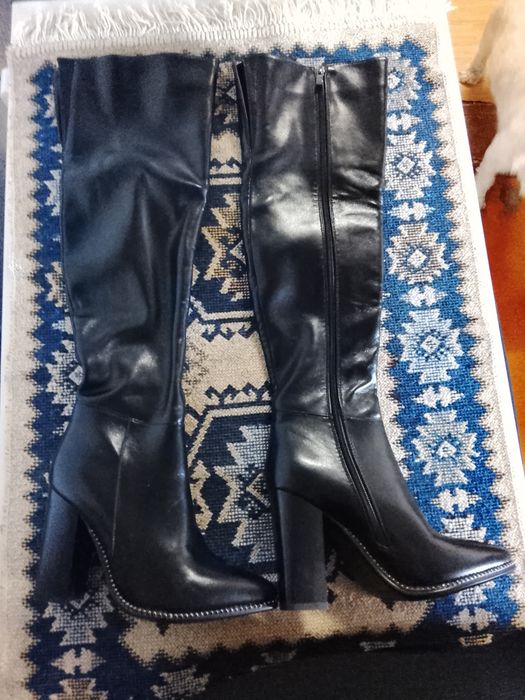 Продам сапоги новые