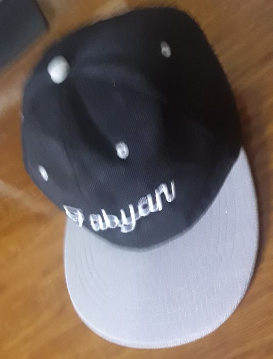 Șapcă Fabian gri cu negru.