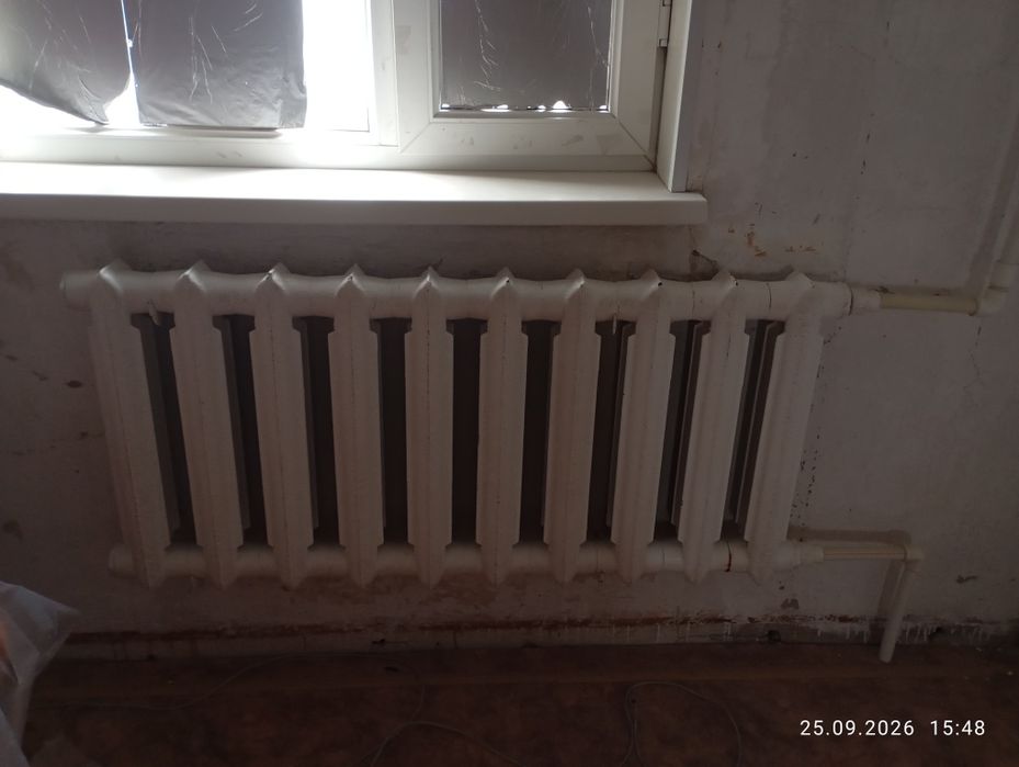 Продам батареи  чугунные