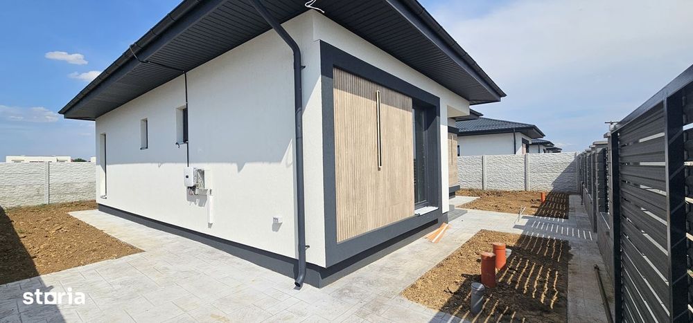 Casa 4 camere,panouri fotovoltaice,200 m de blv.