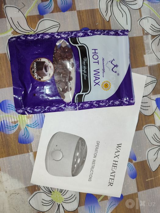 Depilyatsiya qozonchasi, konfet va choʻplari bilan