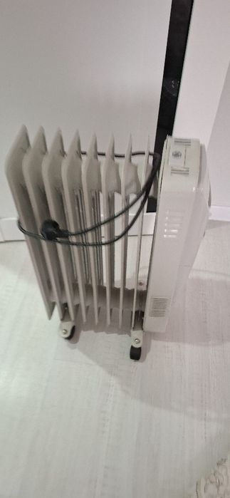 Масленый радиатор почти новый