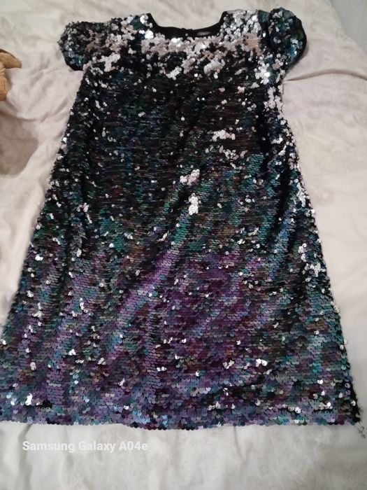 Платье с поетками