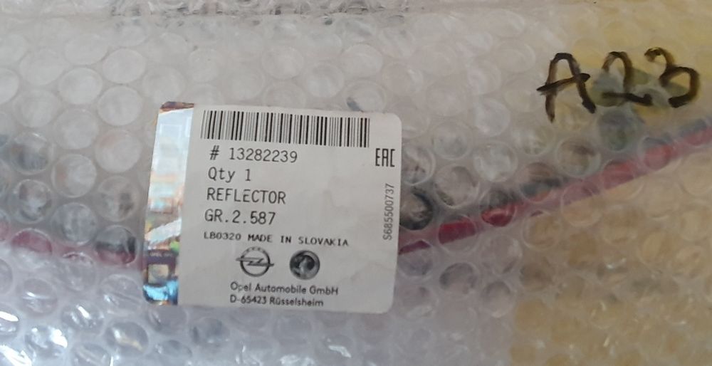 Catadioptru stg dr spate Opel Astra J, Gm 13282239,13282240