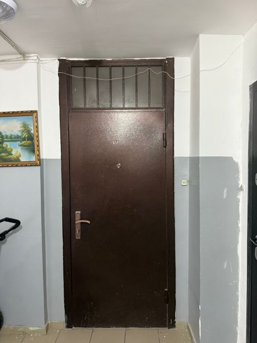 Сырткы темір есік