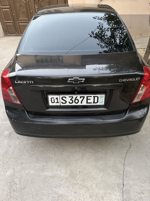Gentra 2015 qora rang .holati zor