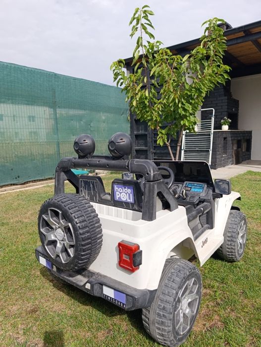 Mașinuță electrica cu telecomanda și pedale .2+ jeep rubicon