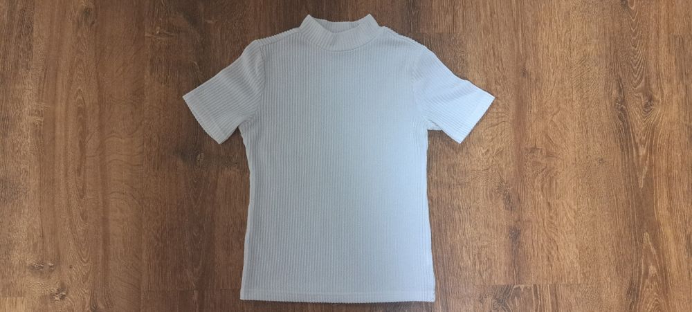 Продам блузку 140 см