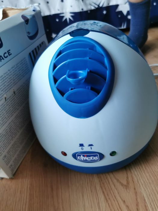 Vând umidificator chicco